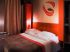 Ambiance 70's dans la chambre orange
