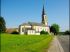 L��glise Saint-L�ger occupe le paysage de la commune de Manspach (68)