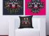 Des coussins et tableaux au motif t�te de mort