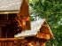 Un mini village en rondins de bois