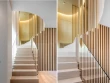 L'entrée et son escalier en travertin