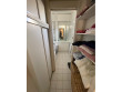 Une salle de bain couloir peu confortable 