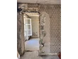 Une ancienne chambre d&eacute;labr&eacute;e