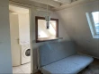 Une mini-chambre de bonne de 16 m&sup2; agrandie par les parties communes