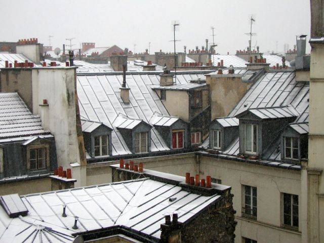 Maison sous la neige