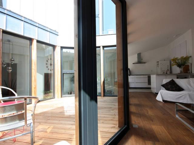 Une terrasse en bois comme une pièce en plus - Rénovation, extension et surélévation à Nantes