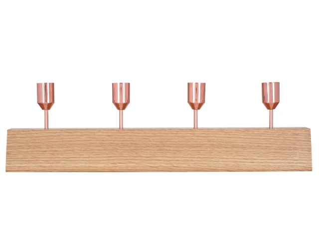 Sur la console du salon, un bougeoir en bois et cuivre rosé - Tendance cuivre rosé
