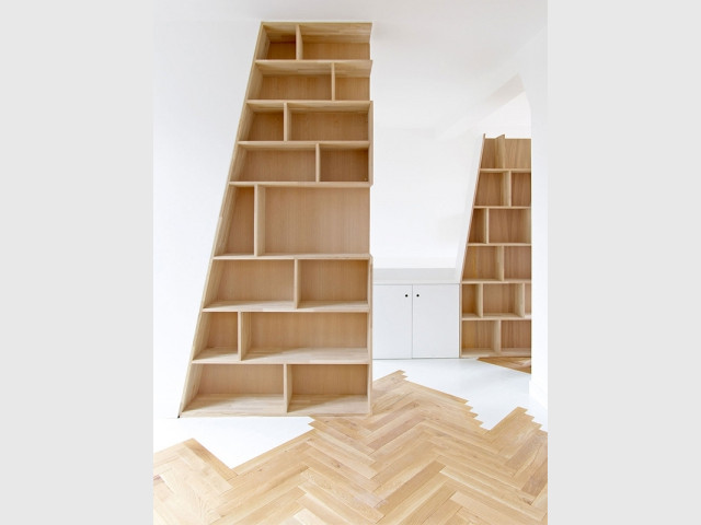 Priorité aux pièces à vivre  - Un appartement structuré et dynamisé par des livres