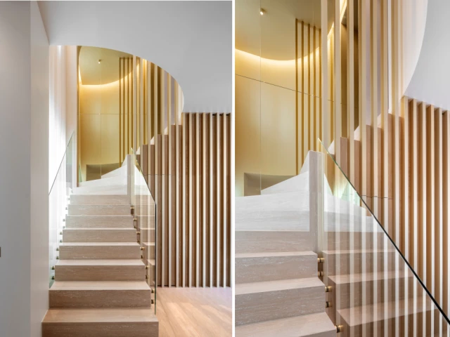L'entrée et son escalier en travertin