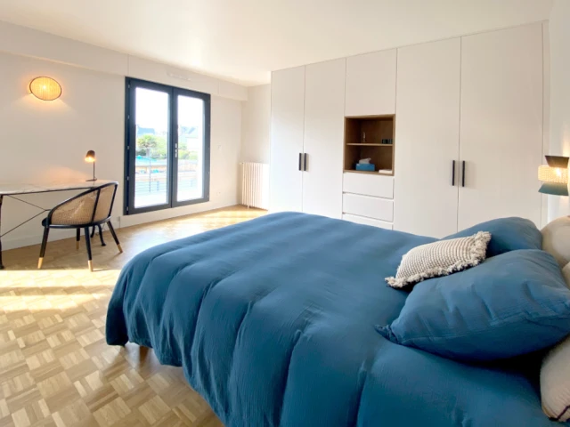 La chambre parentale avec son dressing sur mesure