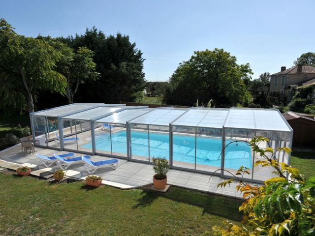 Abri de piscine haut télescopique