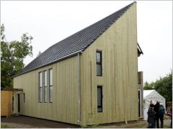 Une maison bois super-isol&eacute;e avec de la laine de roche